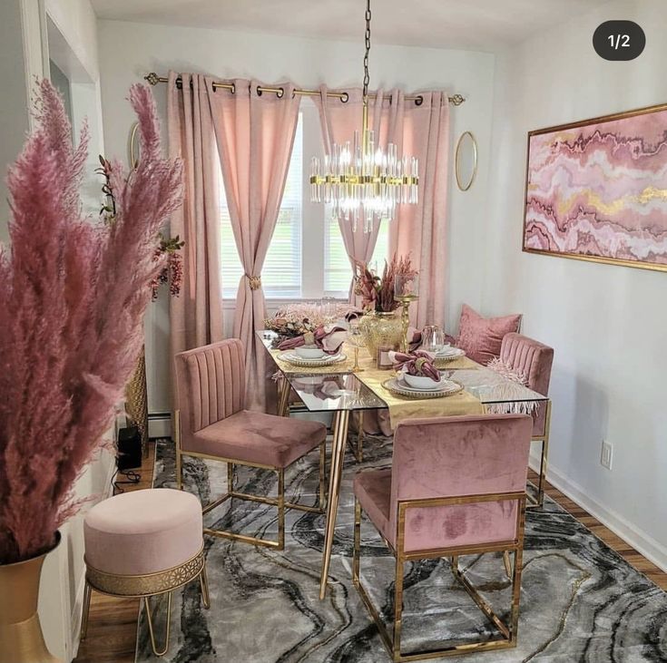 the dining room is decorated in pink and gold