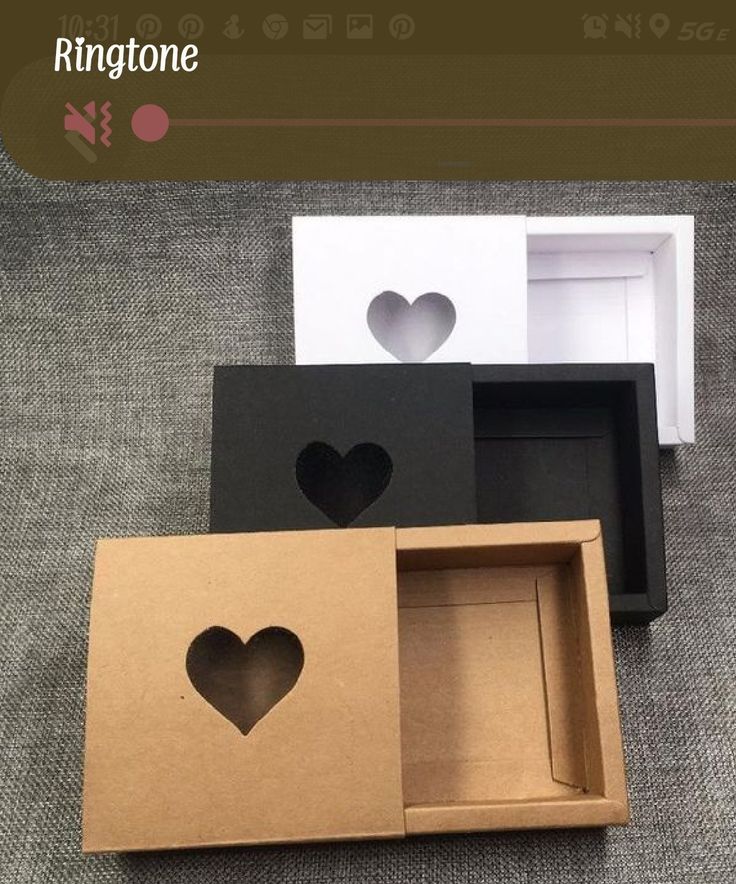 three boxes with hearts cut out of them