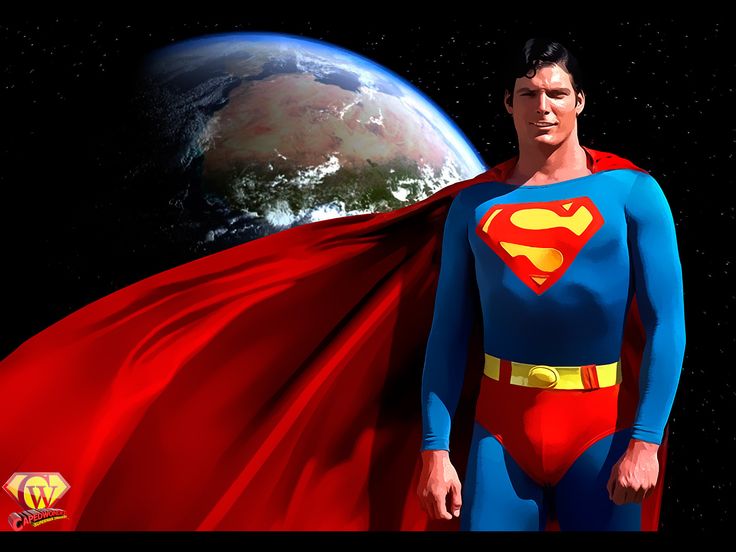 a man dressed as superman standing in front of the earth