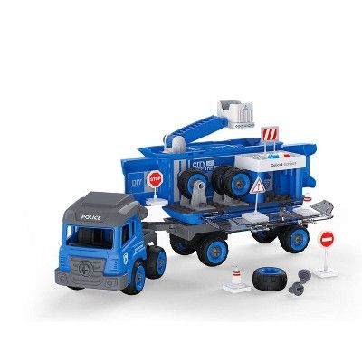 a blue toy truck and some cars on a white background