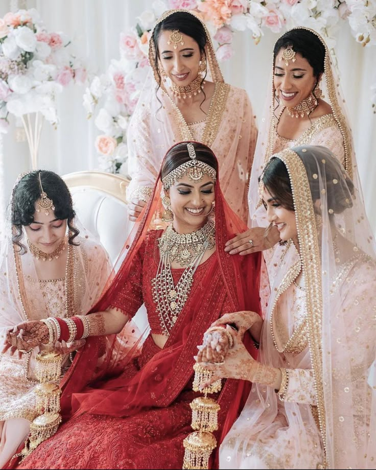 the bride and her bridals are getting ready for their wedding ceremony in india