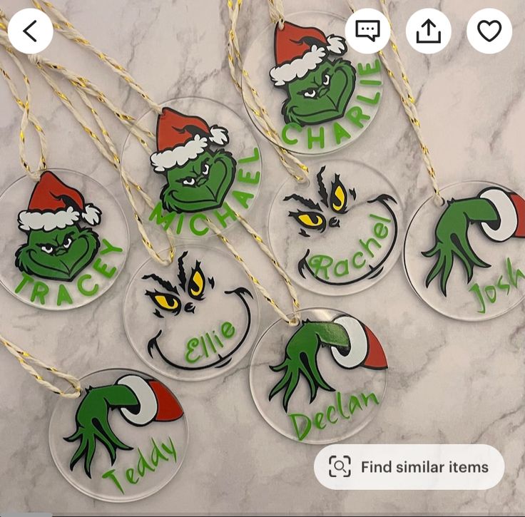 christmas ornaments with grin face and name on them