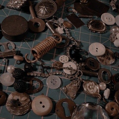 many different types of buttons on a table