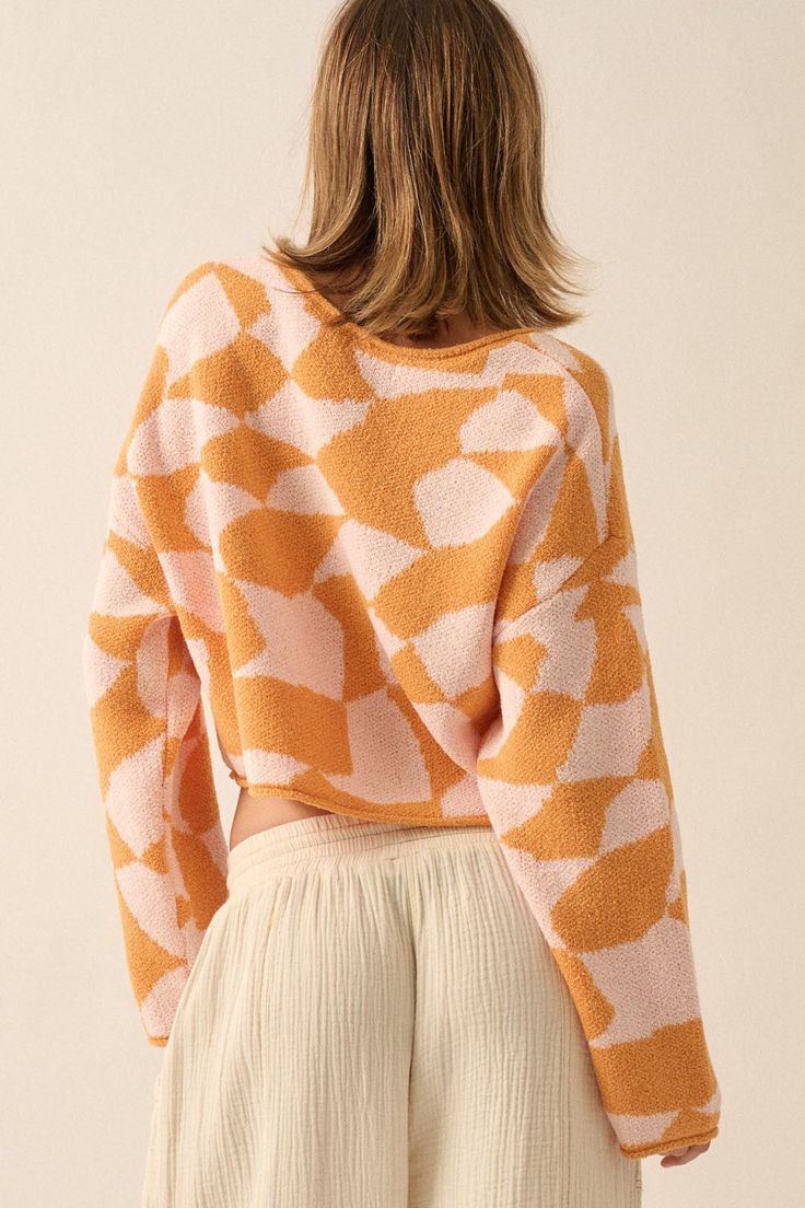 Boat neckline Rolled neckline, cuffs, and hem Long sleeves Dropped shoulders Cropped length Relaxed fit Apricot Sweater, Rolled Collar, Checkerboard Pattern, Pink Sand, Pink Abstract, Pattern Sweater, Boat Neckline, Cropped Sweater, Boat Neck