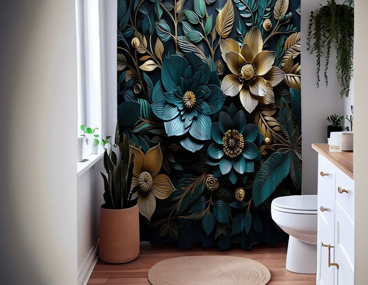 a bathroom with a shower curtain decorated with flowers and leaves in gold, green and blue colors