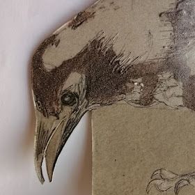 a drawing of a bird with long beaks and an open mouth, on top of a piece of paper