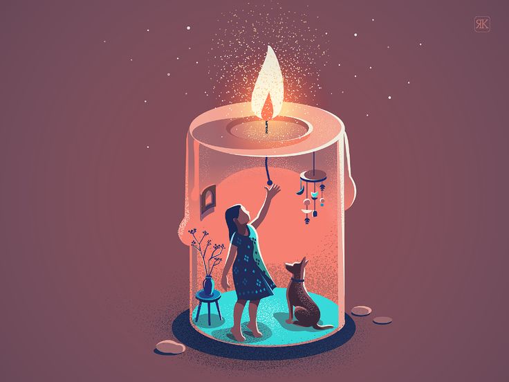 a woman standing in front of a lit candle with a cat sitting next to it