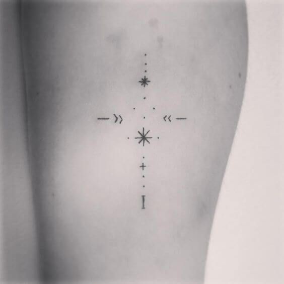 the back of a woman's stomach with arrows and stars on her left side