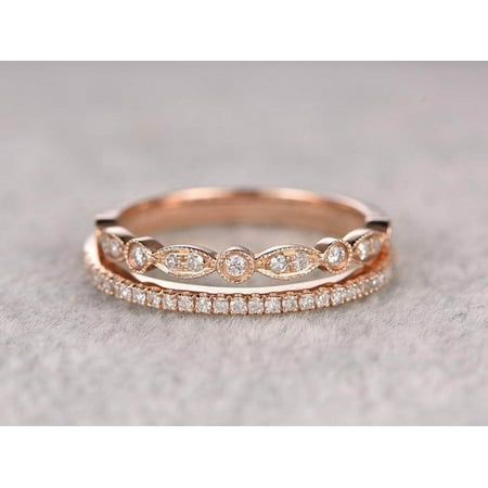 a rose gold wedding band with diamonds