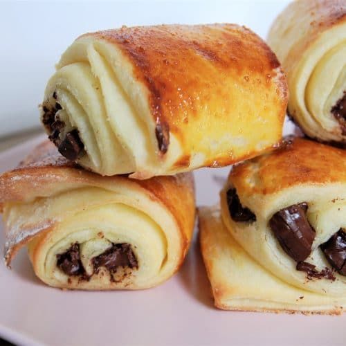 several pastries are stacked on top of each other in the shape of chocolate chips