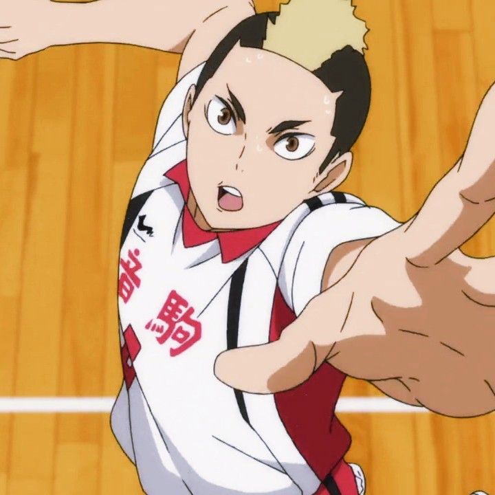 an anime character is holding his arm out and pointing at the ball in front of him