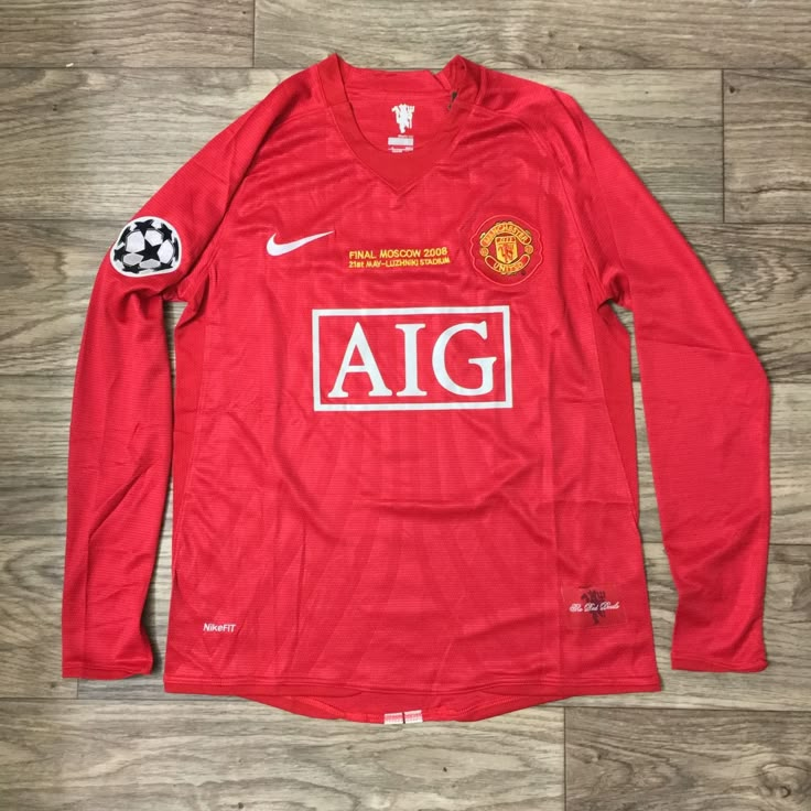 the manchester united home shirt is on display