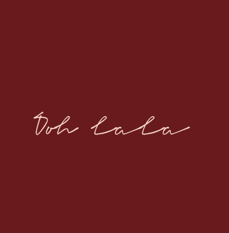 a red background with the words do la la la written in cursive writing