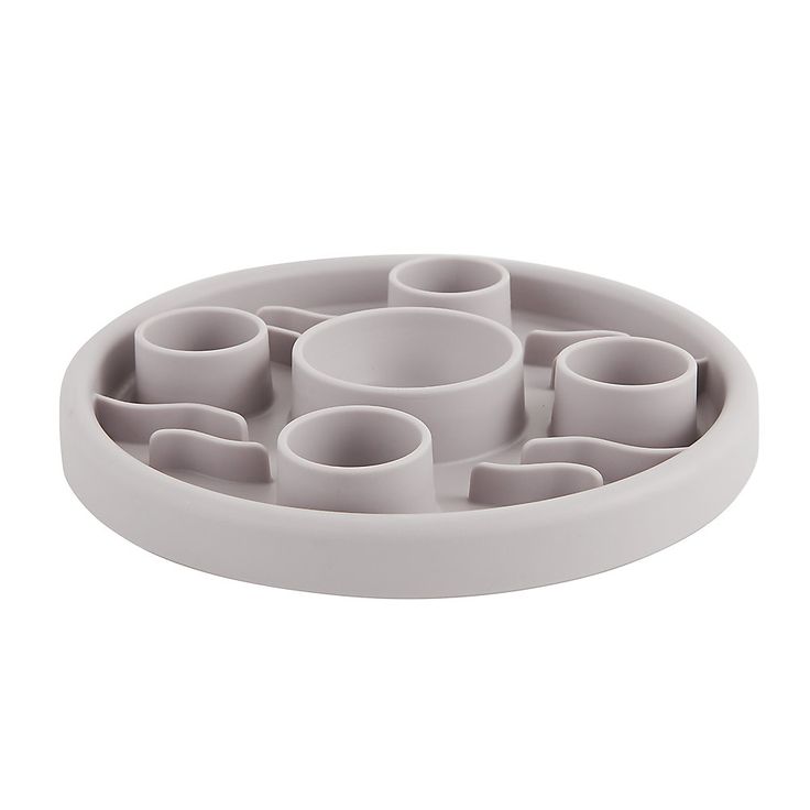 a white tray with cups and saucers in it