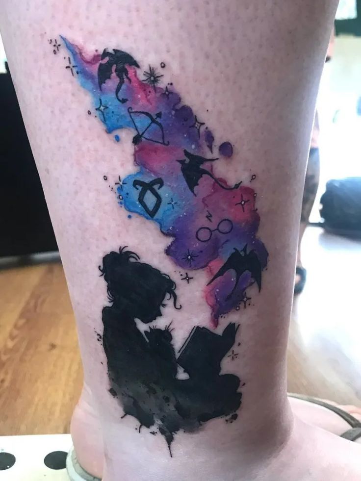 a person with a tattoo on their leg