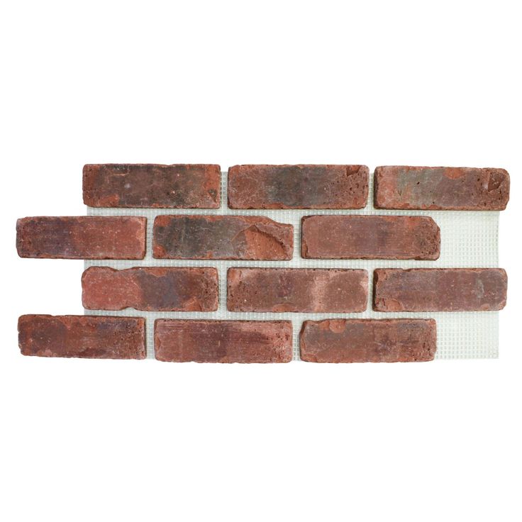 a brick wall that is made out of red bricks