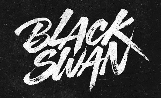 the word black swan written in white ink on a black background with some type of graffiti