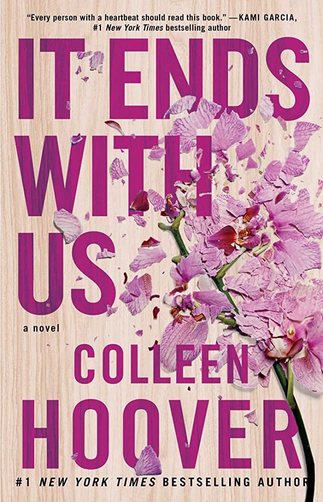 the cover of it ends with us by collien hoover is displayed on a bed