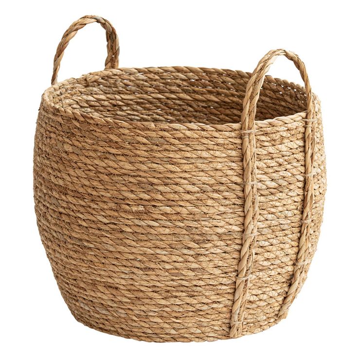 a large round basket with handles on the bottom and rope around it's sides