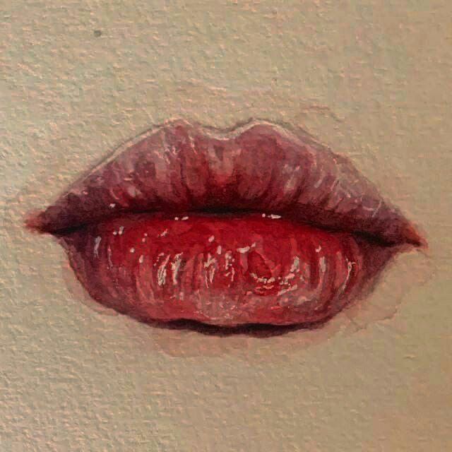 a watercolor painting of a red lip