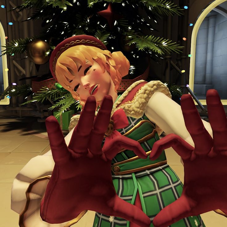 an animated image of a woman wearing red gloves and holding her hands up in front of a christmas tree