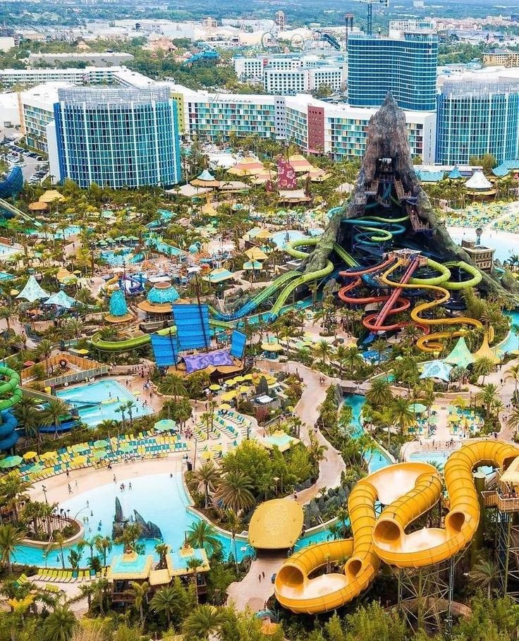 an aerial view of the water park with slides and waterslides in front of it