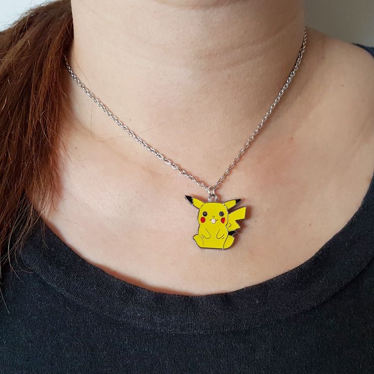 Pokemon Pikachu Sitting Down Necklace Silver Chain or Black Rope Pokemon Jewelry, Pokemon Pikachu, Black Rope, Silver Chain Necklace, Necklace Silver, Silver Necklaces, Silver Chain, Pikachu, Chain Necklace