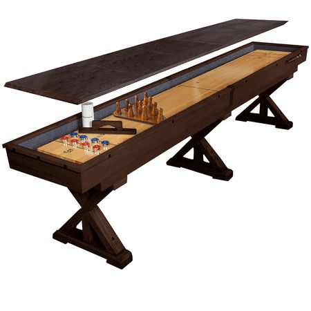 a wooden shuffle table with two pieces of chess on it