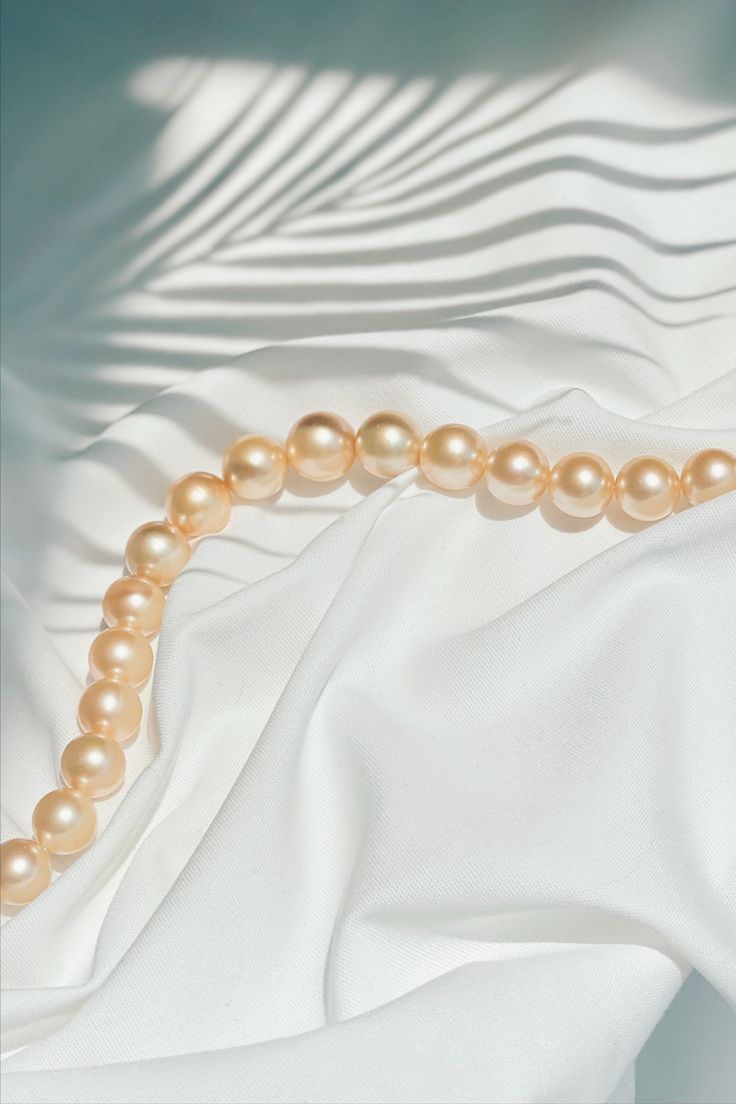 Silk And Pearls Aesthetic, Pearls Aesthetic Photography, Pearl Color Aesthetic, White Pearl Aesthetic, Jewelry Aesthetic Wallpaper, Pearly Aesthetic, Pearls Aesthetic Wallpaper, Pearlcore Aesthetic, White + Core + Aesthetic