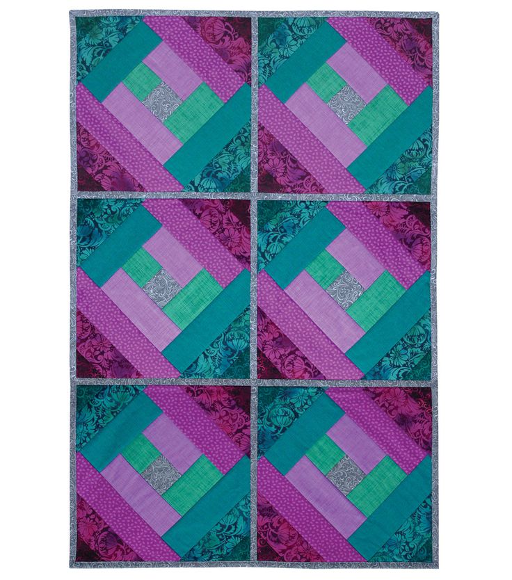 four quilt squares with different colors and patterns on the top one is blue, green, pink