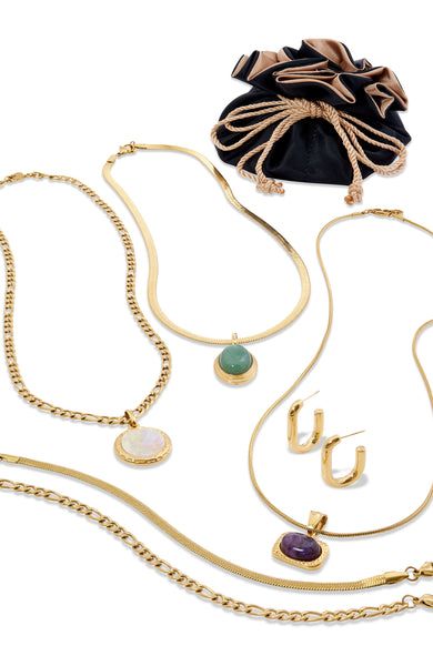 9 Piece Genuine Gemstone 18K Gold Plated Travel Jewelry Set *Includes:   3 Necklaces 3 Genuine Gemstone Pendants 2 Bracelets 1 Pair of Earrings Travel Jewelry Pouch and Box Figaro Chain Necklace, Gold Jewelry Sets, Amethyst Pendant, Travel Jewelry, Jewelry Pouch, Snake Chain, Gemstone Pendant, Chain Bracelet, Jewelry Gift