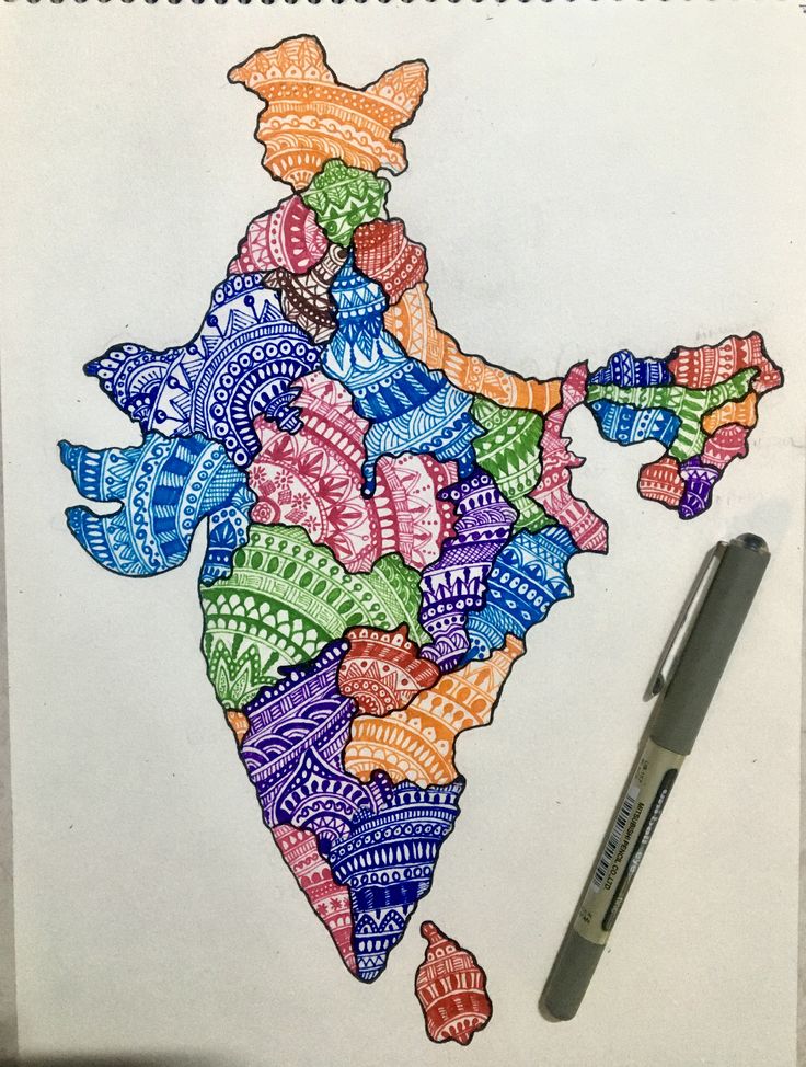 a drawing of the state of india on paper with marker and pen next to it