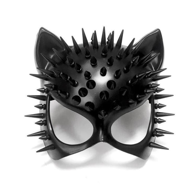 Jagged, fearful, and spiky are three ways to help summarize this black accent cat women. With a unique layer of texture coating the mask, scare anyone and be a mystery to anyone. Spikes attached to black masks are black metal. Cat Woman Mask, Mask Ball Party, Mask Wolf, Cat Masquerade Mask, Masquerade Mask Costume, Masquerade Mask Black, Silver Masquerade Mask, Woman Mask, Black Masquerade