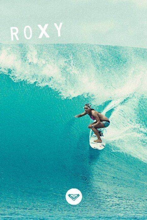 a man riding a wave on top of a surfboard in the middle of the ocean