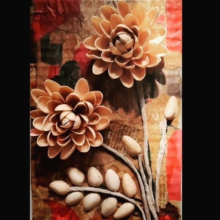 a collage with paper flowers and leaves on top of each other, in the middle of