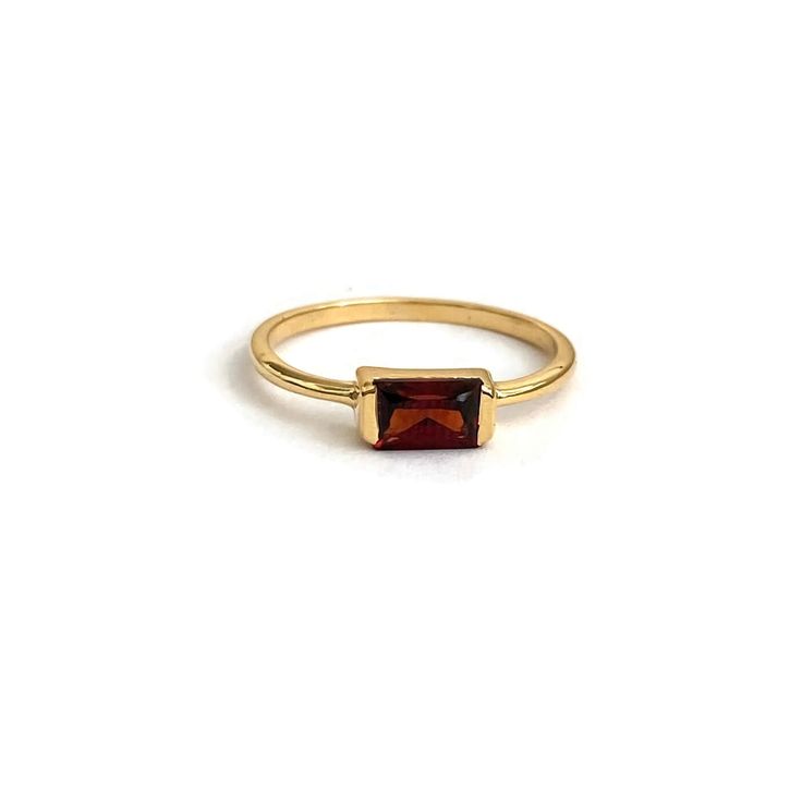 This is a Baguette Garnet Ring featuring a genuine garnet stone, this ring is available in sizes 5-8 and is crafted with a thick 3-micron gold vermeil Garnet Meaning, Green Tourmaline Ring, Bezel Earrings, Gemstone Drop Earrings, Garnet And Gold, Sparkle Necklace, Gemstone Beaded Necklace, Gold Filled Ring, 14k Gold Necklace