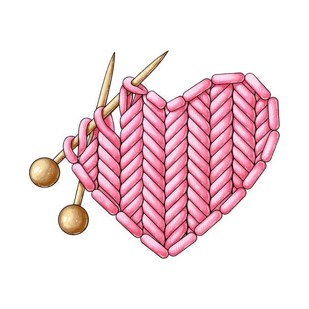 a heart shaped object with knitting needles in it