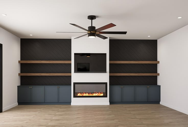 a living room with a fireplace and built in shelving units on either side of the wall