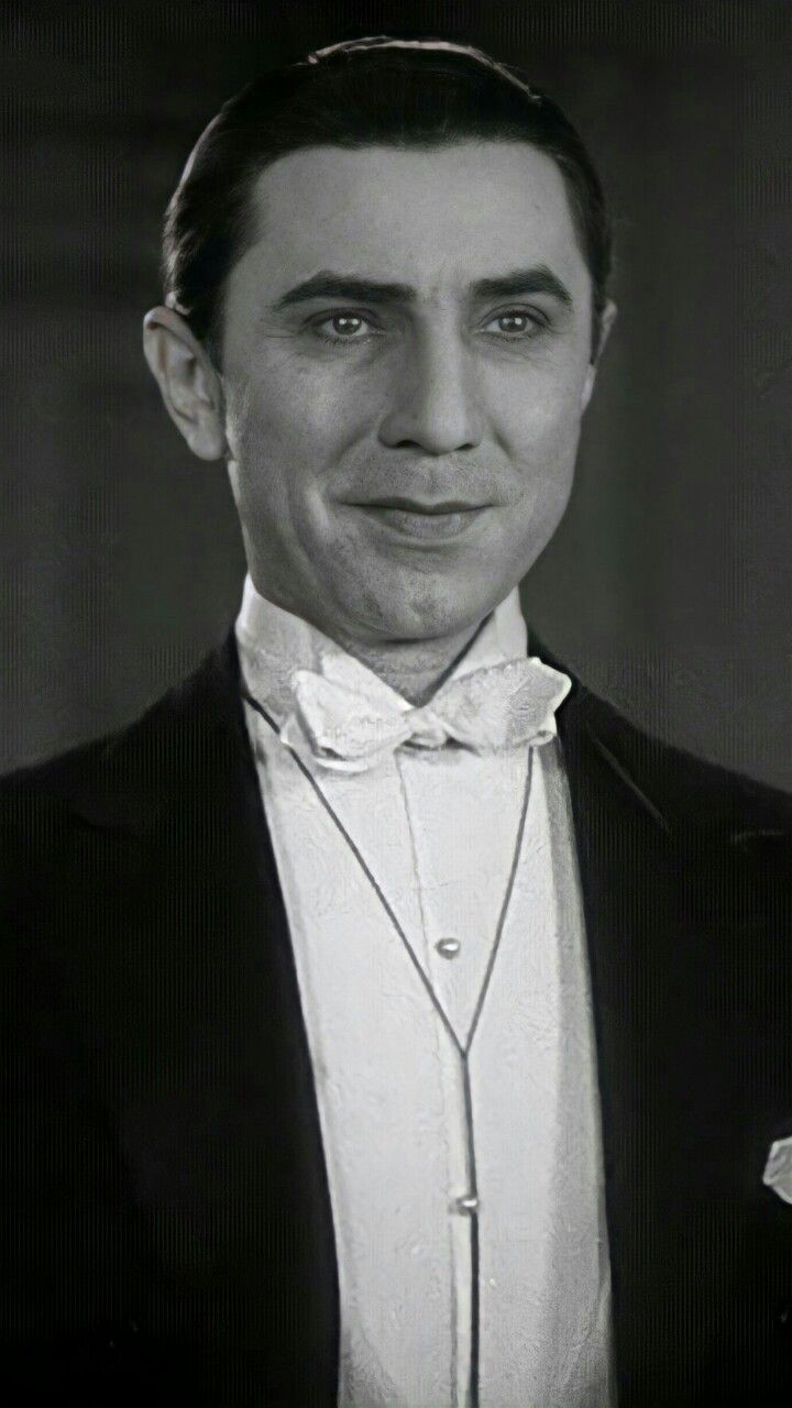 a man in a tuxedo and bow tie