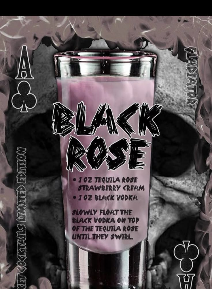 a black rose shot glass sitting on top of a table