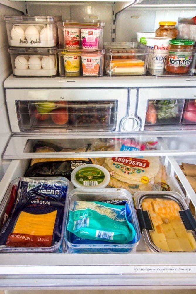 an open refrigerator filled with lots of food