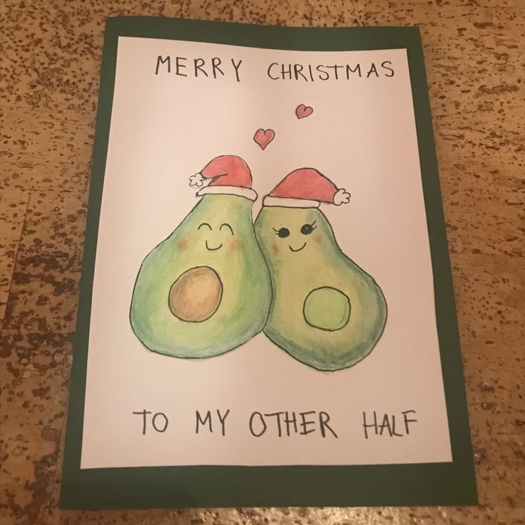 a christmas card with two avocados in hats on top of each other and the words merry christmas to my other half