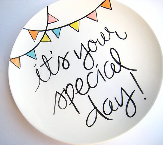 a white plate with the words it's your special day written in cursive writing