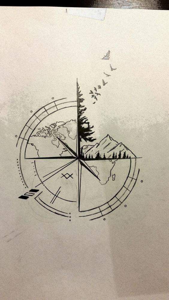 a compass tattoo on the side of a white paper with trees and mountains in it