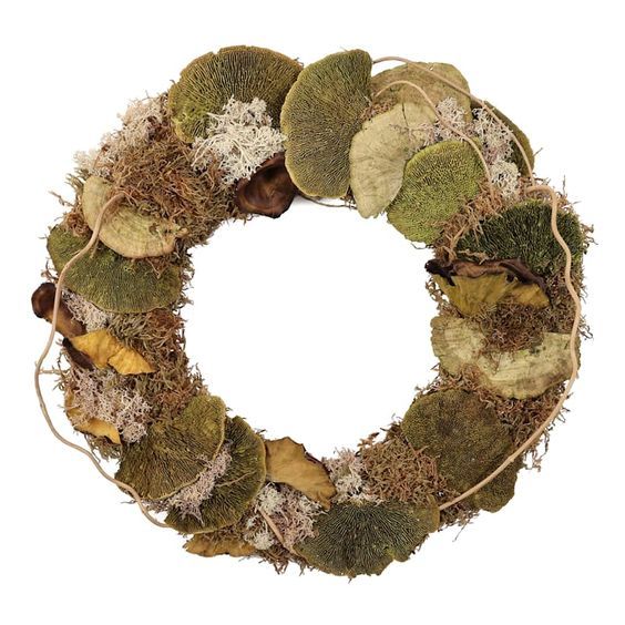 a wreath made out of moss and leaves