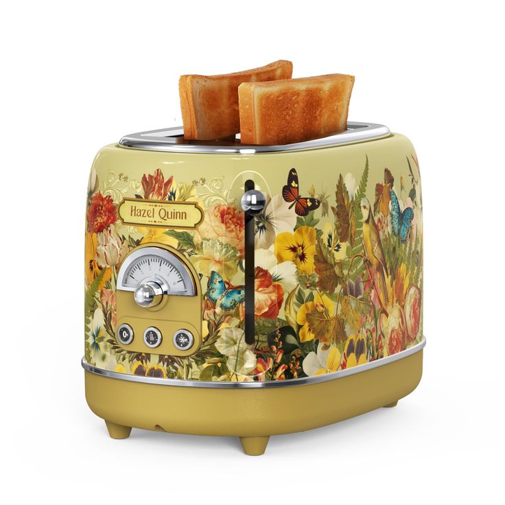 a toaster that has some slices of bread on it and is decorated with flowers