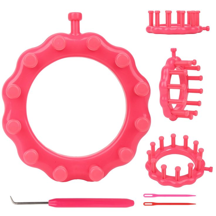 a pink toy set with plastic parts and tools to make it look like an instrument