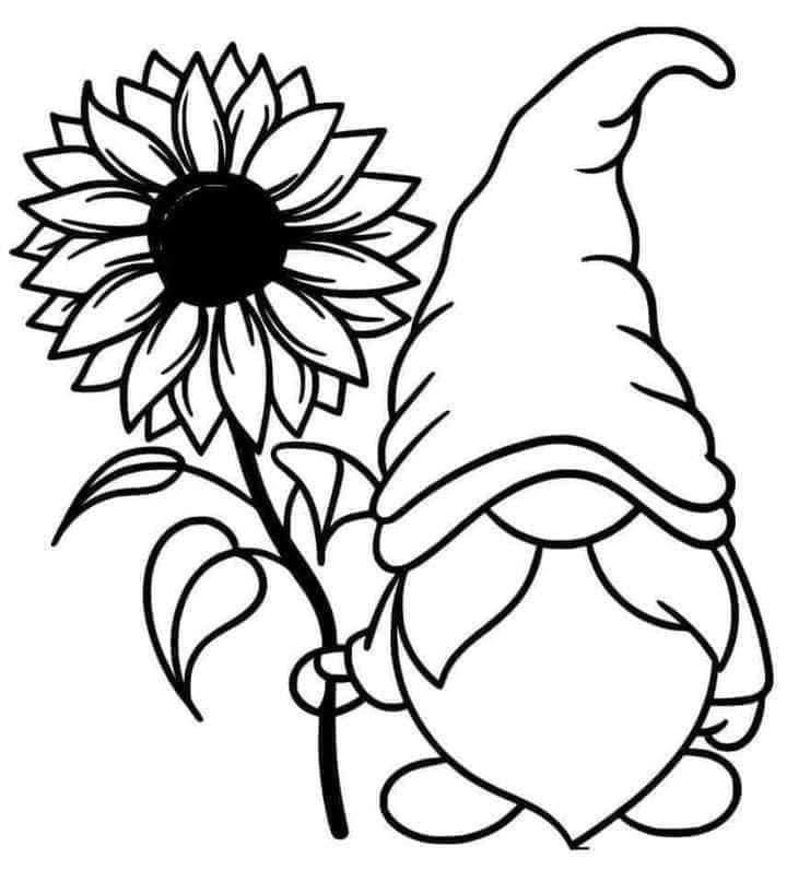 a sunflower with a gnome's hat on it next to a large flower