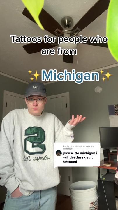 a man standing in front of a ceiling fan with the caption, tattoos for people who are from michigan