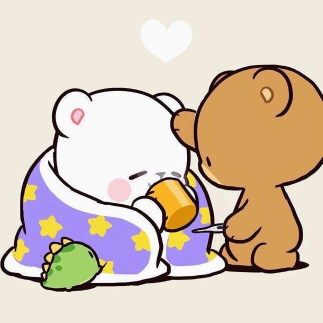 a brown bear and a white bear sitting next to each other